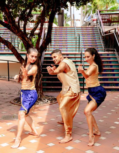 Dr. Niraj Mehta and two dancers